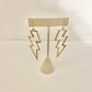 Gold lightning bolt earrings