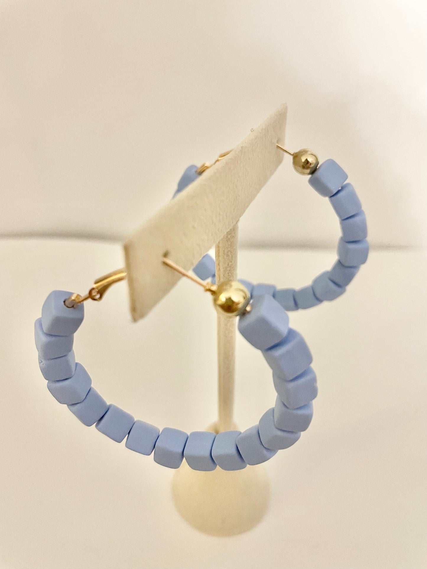 Blue beaded hoops